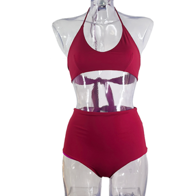 Sissi top and Easy bottom, a sport triangle bikini and high-waisted bottom in red purple and violet color.